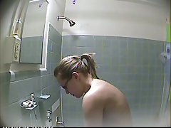 Check out hidden cam of my own wife taking a shower coupled with flashing tits